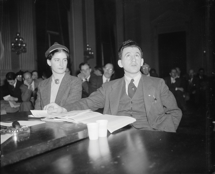 Black-and-white photo of Joseph P. Lash, Executive Secretary of the American Students' Union, and Miss Agnes Reynolds, College Secretary of the Union while being questioned by The Dies Committee Investigating un-American activities.