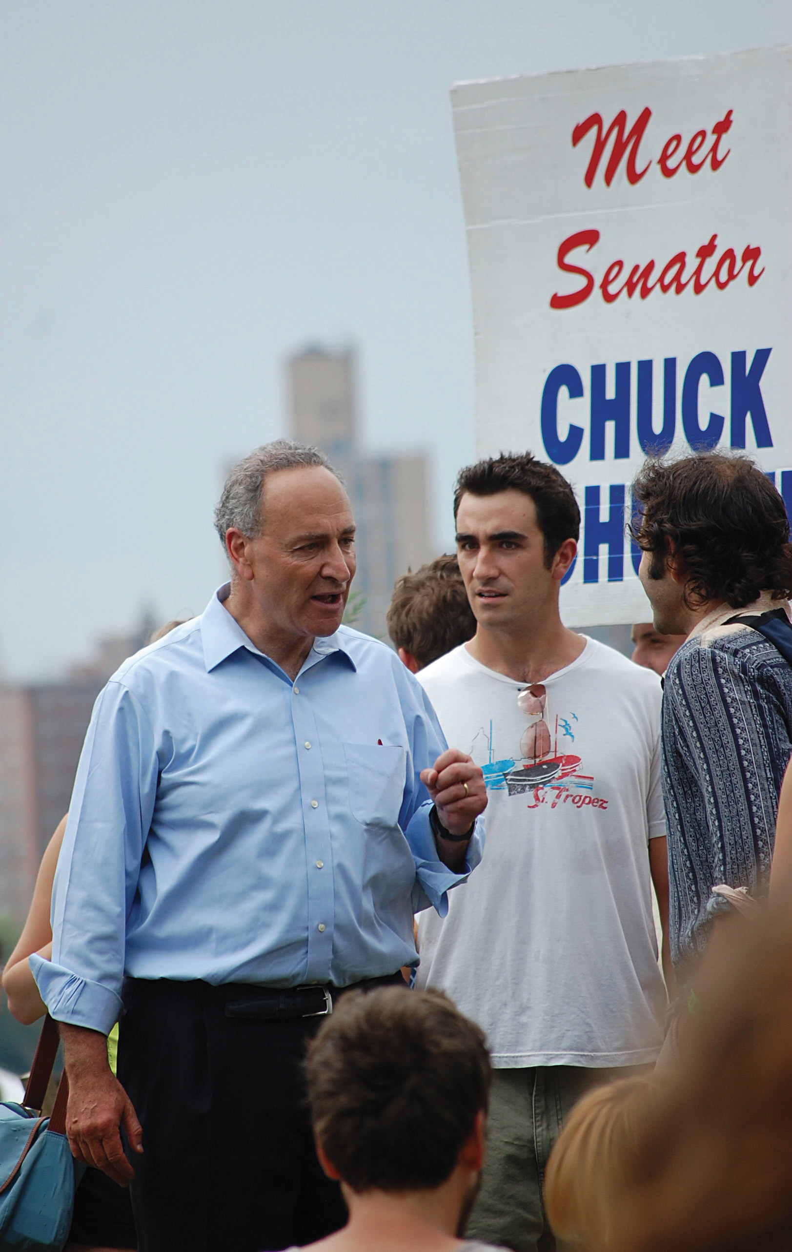 Photo of Chuck Schumer talking to supporters.